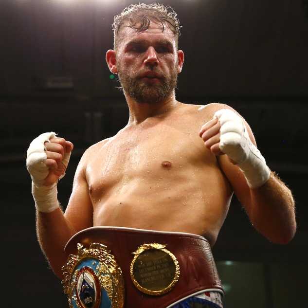 Billy Joe Saunders celebrating a victory wearing a belt