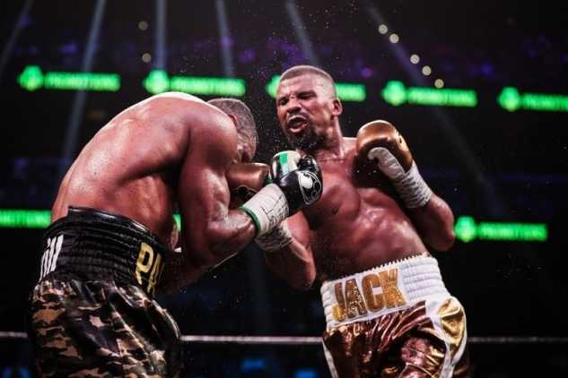Badou Jack hitting an opponent with a right hook to the body