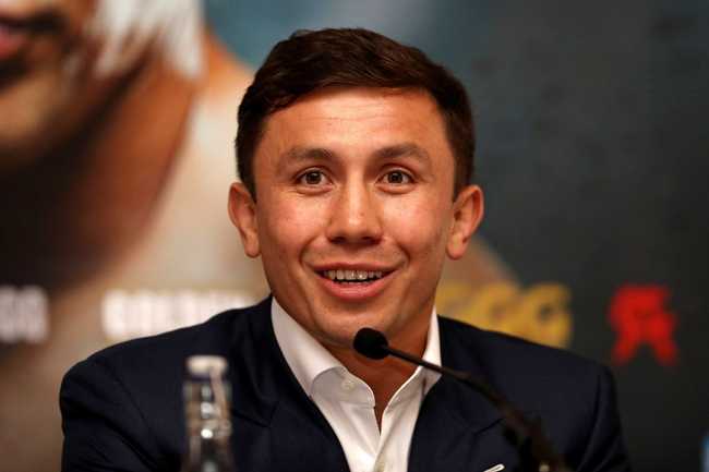 GGG at a press conference wearing a suit with no tie