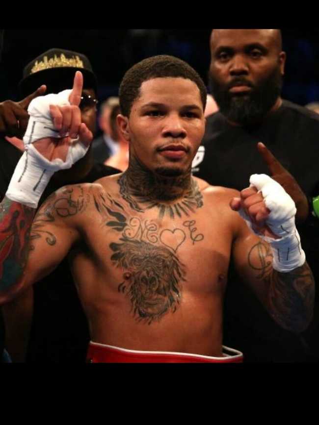 Gervonta Davis standing in the ring with his gloves off after a fight
