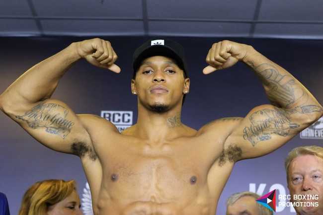 Anthony Yarde doing a muscle pose with no top on