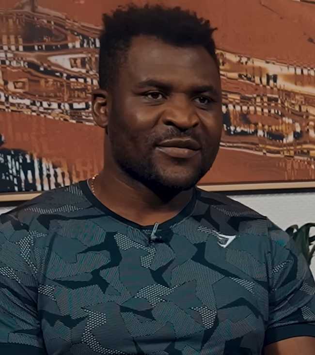 Francis Ngannou wearing a sports top 